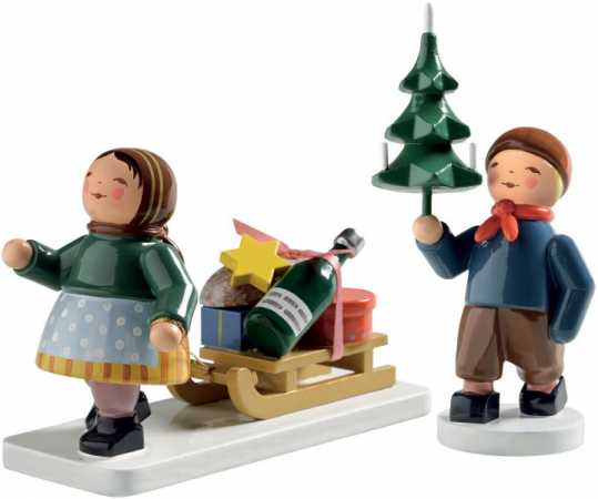 Girl with sledge/boy with tree